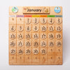 Wooden Perpetual Calendar with coloured days, the month hangs on pegs and can be changed as well as the days | © Conscious Craft